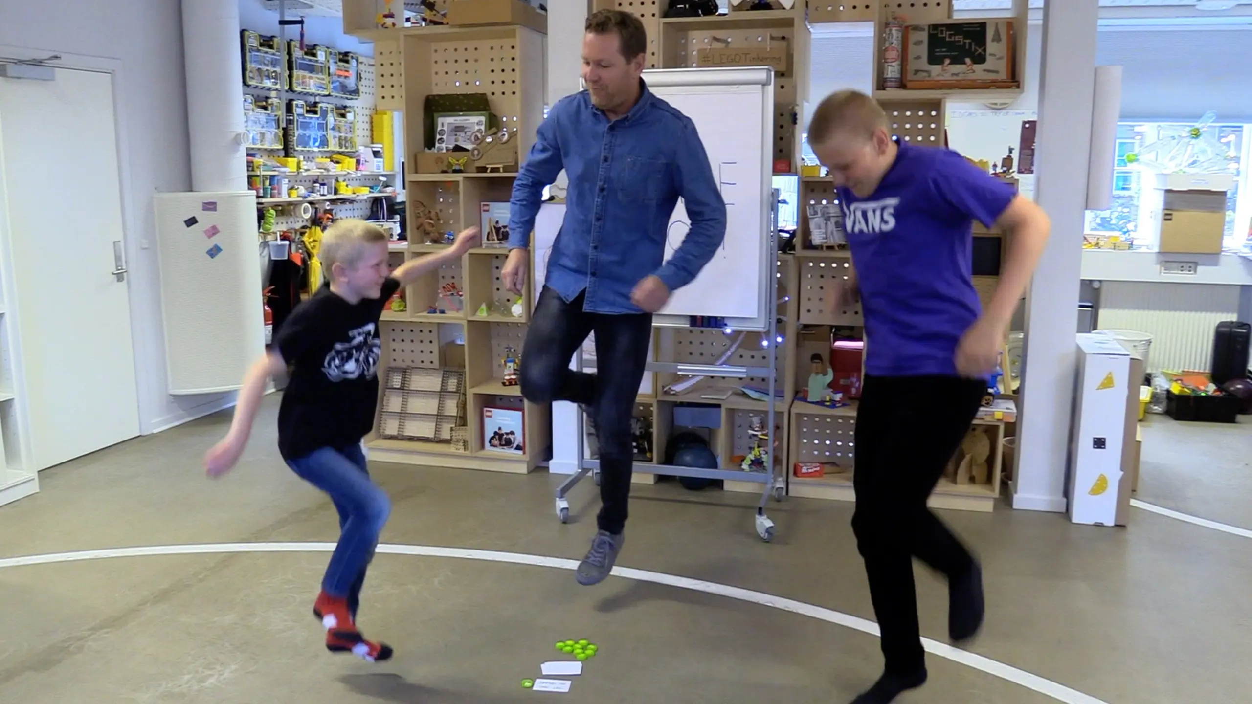 three players jumping around on one foot